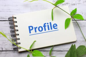メモ帳に「Profile」と書かれたイラスト